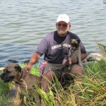 John and the pups at Lake Herman